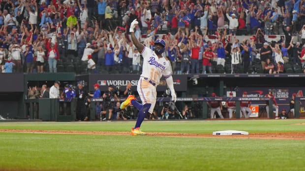 Rangers outfielder Adolis García celebrate after hitting a walk-off home run in Game 1 of the World Series.